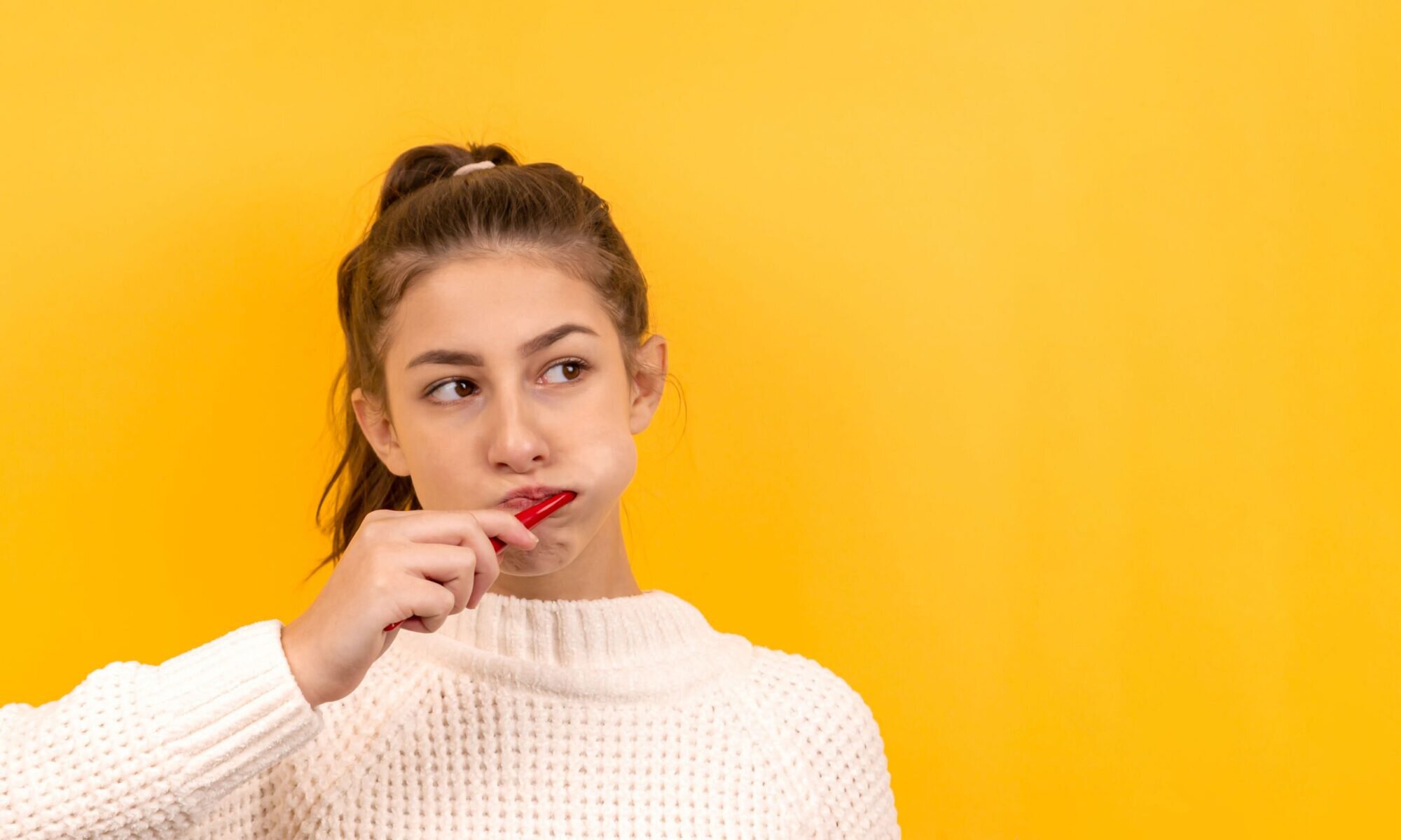 Sherman Oaks cosmetic dentistry model brushing her teeth