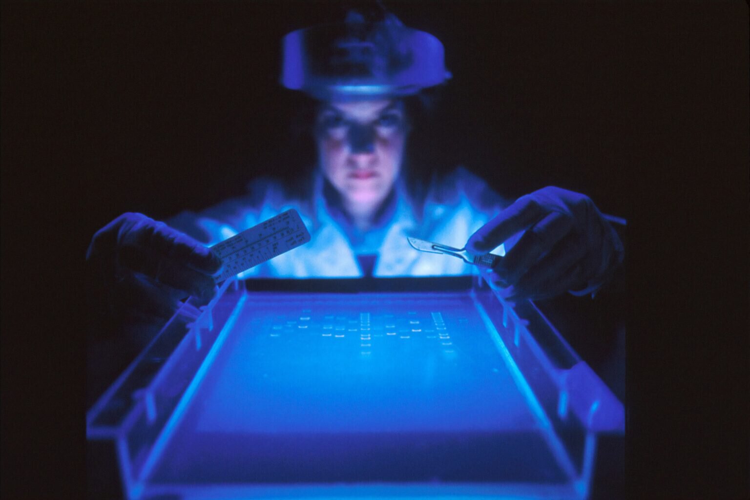 scientist with various tools in hand