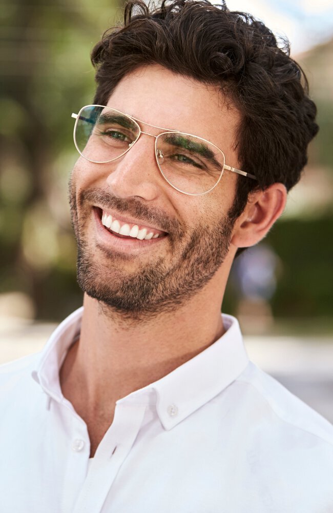 Sherman Oaks Cosmetic Dentistry model with glasses